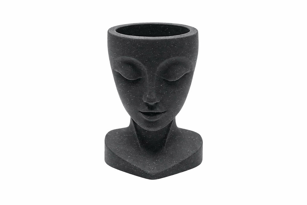 macetero rostro minimalista decoracion hogar vista frontal color negro fondo blanco