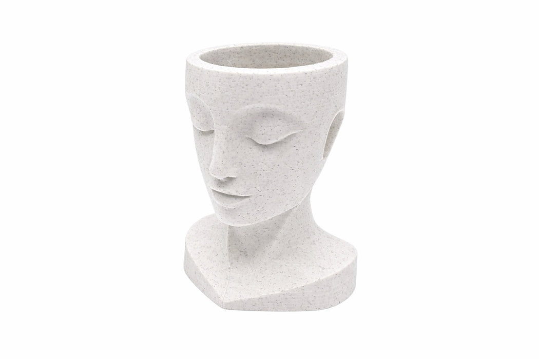 macetero rostro minimalista decoracion hogar vista inlcinada color mármol fondo blanco