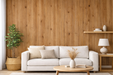Vinilo decorativo efecto madera roble cálido aplicado en pared detrás de un sofá